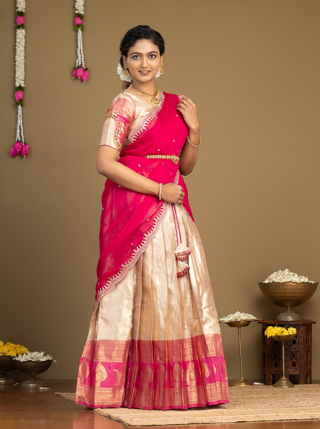 South Indian cream half saree with pink dupatta