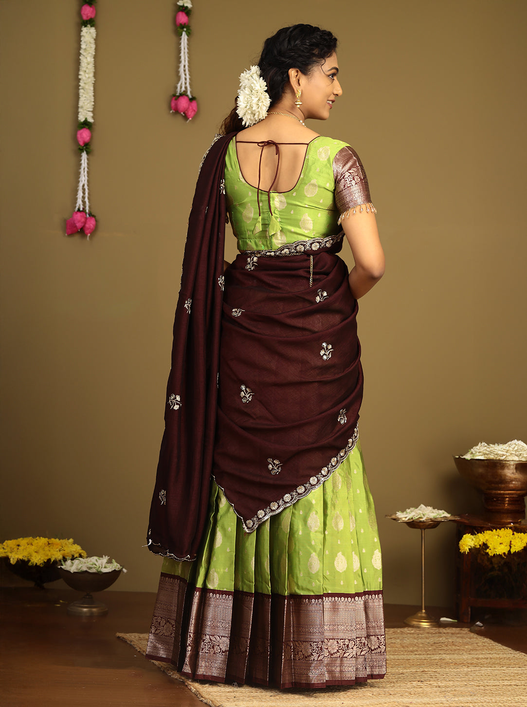 Traditional green pattu half saree with maroon dupatta
