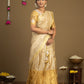 South Indian cream half saree with gold lehenga