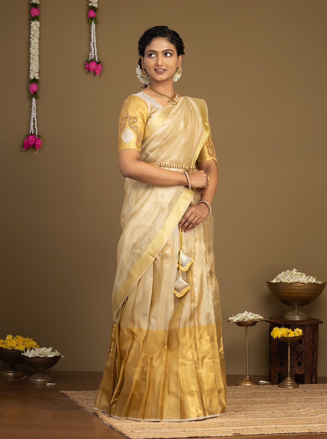 South Indian cream half saree with gold lehenga
