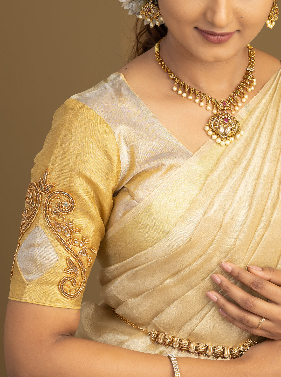 Designer cream silk half saree with golden blouse
