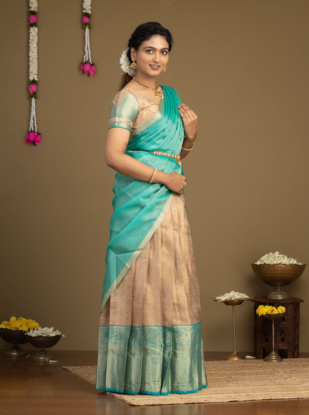 South Indian teal half saree with golden lehenga