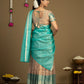 Traditional teal pattu half saree with zari border