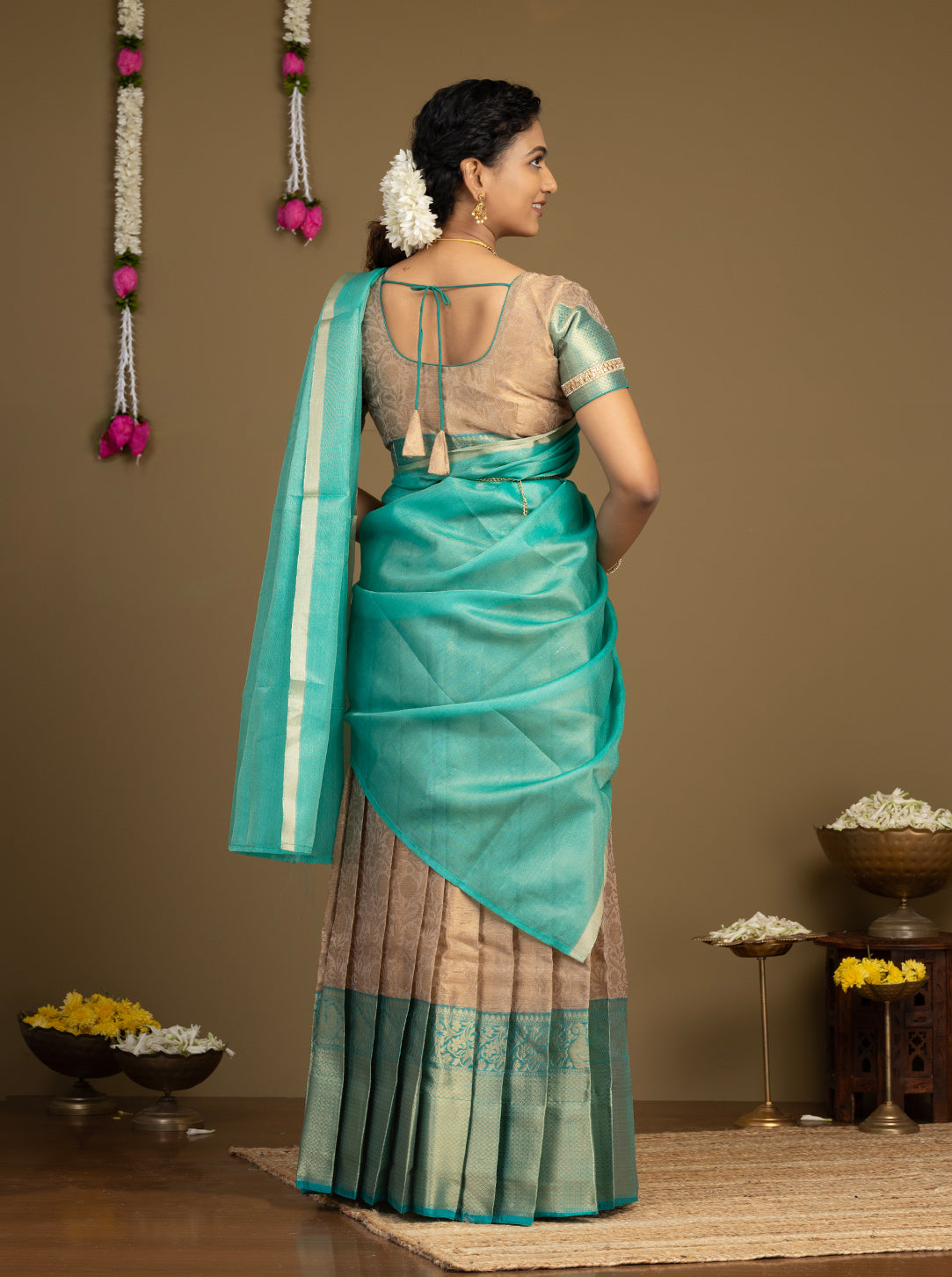 Traditional teal pattu half saree with zari border